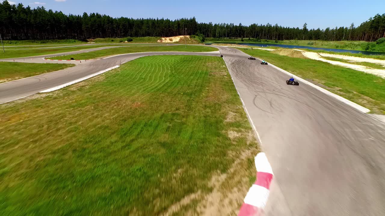 UAV Captures a Panoramic View of Go-Karts Navigating a Challenging Track in Latvia, Illustrating the Alliance's Adaptability and Readiness NATO's Dynamic Response