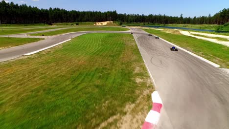uav captures a panoramic view of go-karts navigating a challenging track in latvia, illustrating the alliance's adaptability and readiness nato's dynamic response