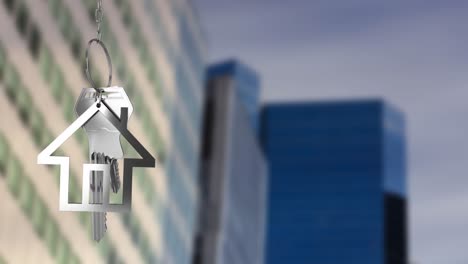 Animation-of-hanging-silver-house-keys-against-blurred-view-of-tall-buildings