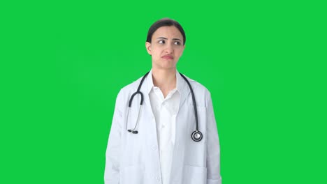 Confused-Indian-female-doctor-asking-what-question-Green-screen