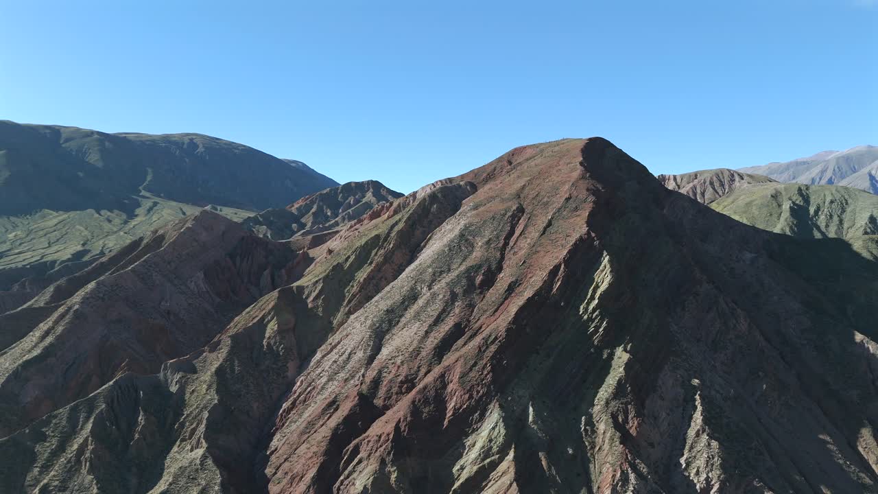 Rock formation with green hues in the Andes Mountains, located in Jujuy, Argentina.