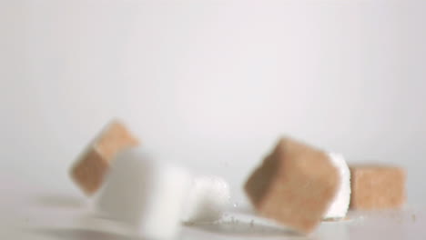 sugar cubes falling down in super slow motion