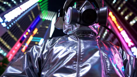 person in protective gear in a city at night