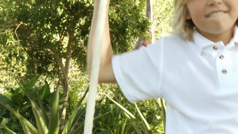 Happy-Boy-on-a-swing