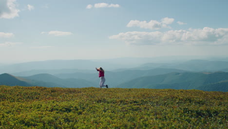 child running on mountaintop