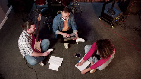 top view of musical group in the studio