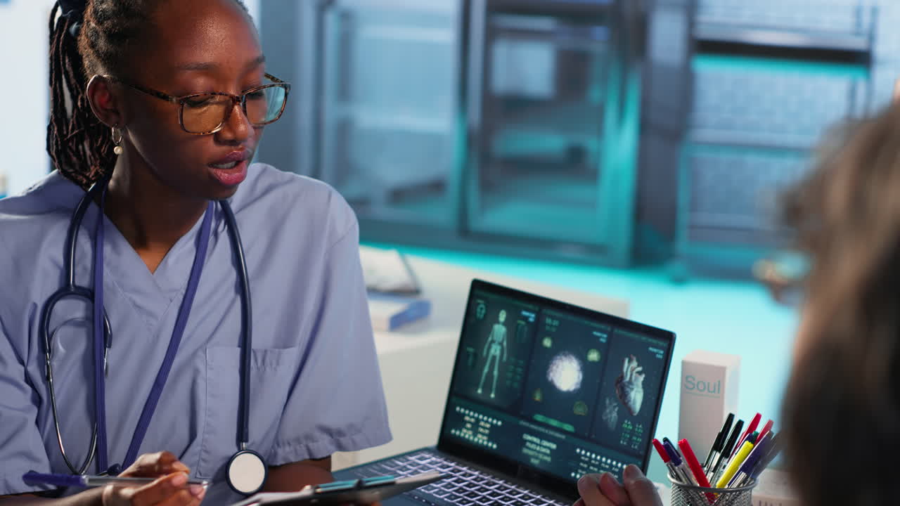 Vertical Video African american nurse evaluating lab test results and creating a recovery plan