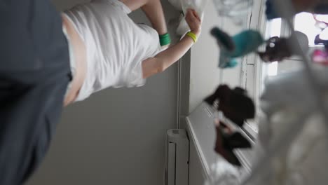 person drying clothes