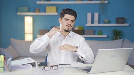 Young-businessman-attending-a-business-meeting-from-home-on-Facetime-giving-a-speech.