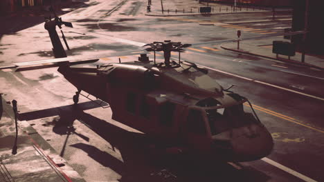 military helicopter in downtown at sunset