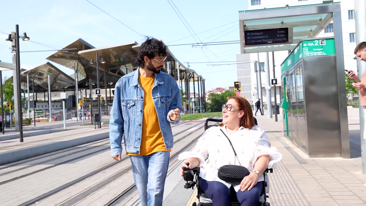 People at a Tram Station