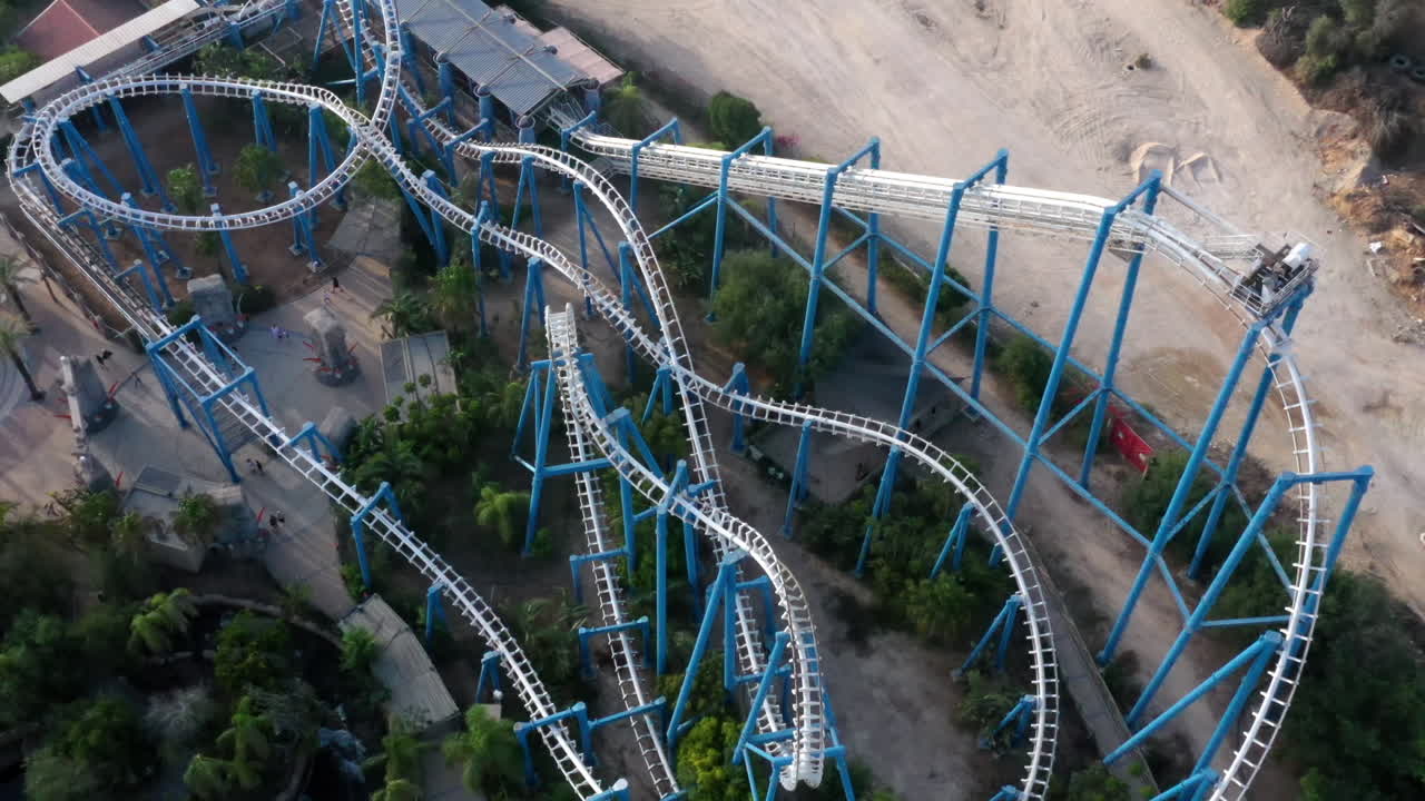 Aerial view of a roller coaster in an amusement park