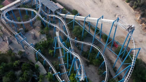 aerial view of a roller coaster in an amusement park