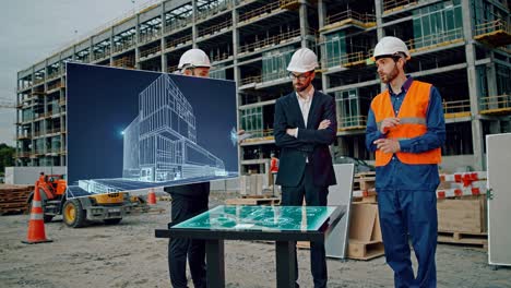 construction team discussing architectural plans at a construction site using digital technology