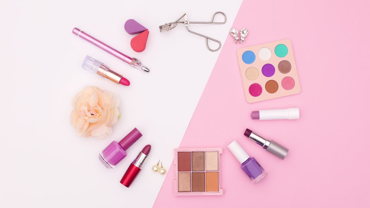 Make up and accessories make circle on white pink theme. Stop motion