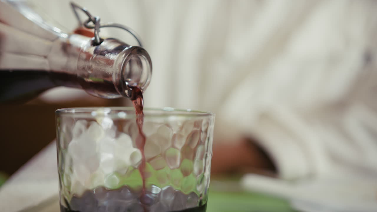 Bottle Pours Calabrian Home Red Wine Into Glass