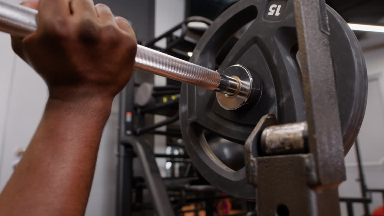 Person lifting barbell