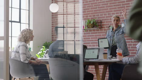 young african american business woman using digital tablet computer presenting financial graph data showing colleagues vote in office presentation diverse team collaborating brainstorming strategy