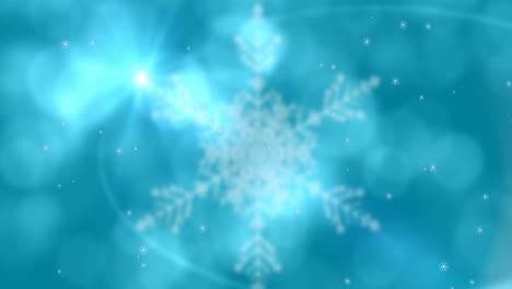 Animation-of-snowflakes-falling-on-blue-background