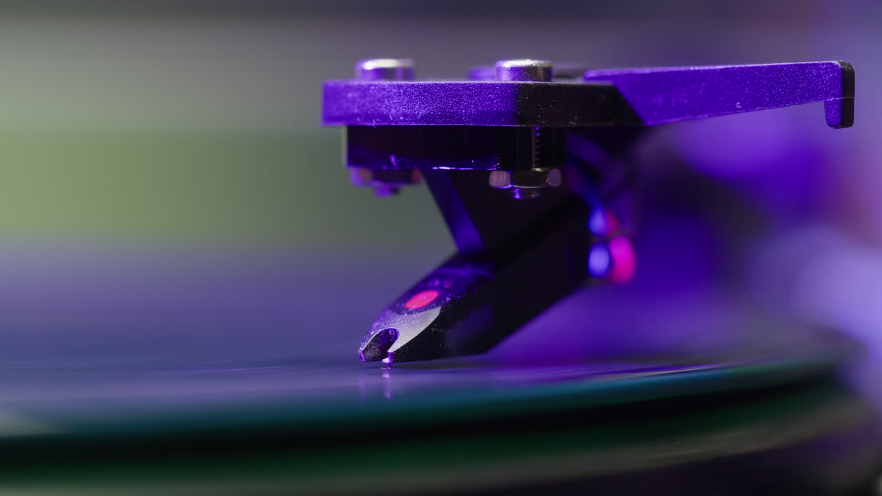 Record Spinning, Vinyl player Record Spinning, Spinning Vinyl Turntable Close Up, macro needle playing music, analog audio track. 4K Resolution.