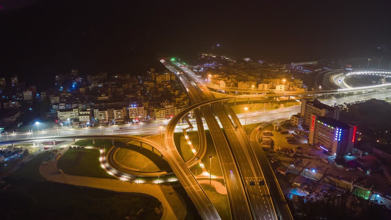 밤에 조명된 주하이 시 교통 도로 교차로 마카오 만 공중 파노라마 4k 타임스 중국
