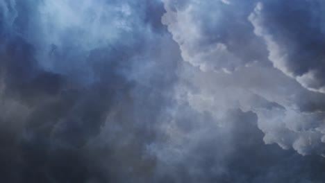 view of cumulonimbus clouds and thunderstorms in the sky moving away
