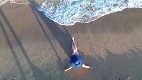 woman sitting at the beach