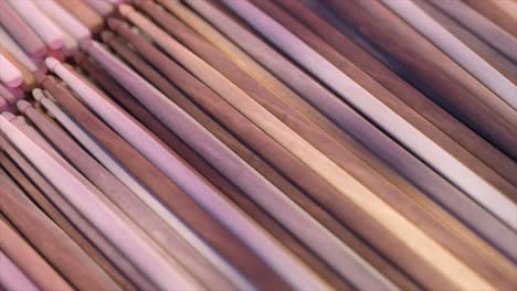 close-up view of many wooden drum sticks