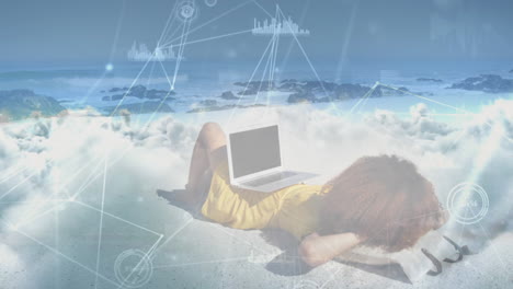 animation of african american woman lying on beach with laptop over clouds and network