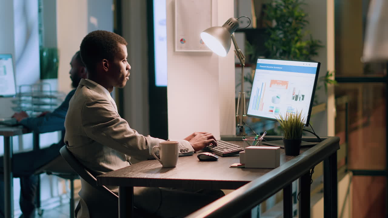 Man working on a computer in an office