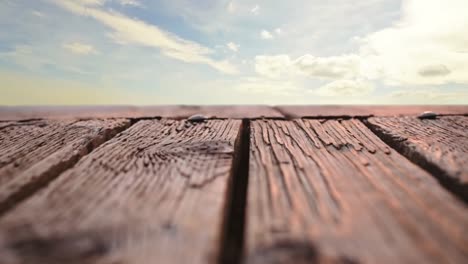 wooden deck with a view of the sky