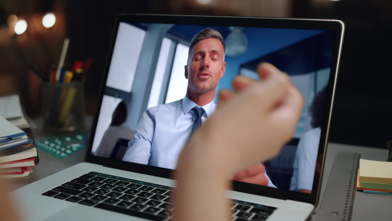 Woman have online interview with hr manager using laptop camera at home close up