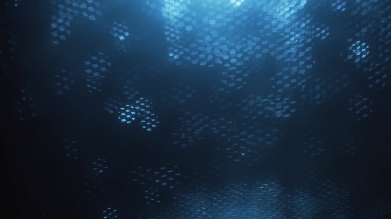 Blue abstract optical blurred background. Optical bokeh overlapped by moving honeycombs.