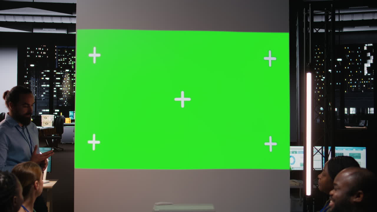 Corporate team participate in late night advisory board session with mockup