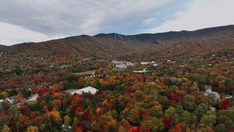 panoramic view at dusk of sugarbush resort in autumn colors in warren, vermont