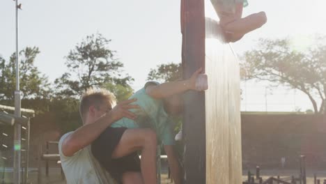 group of caucasian children training at boot camp