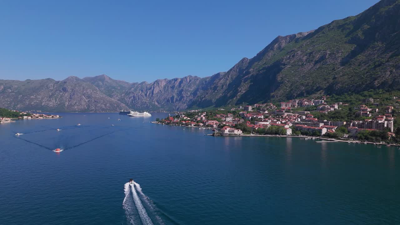Boat sailing in a river aerial footage