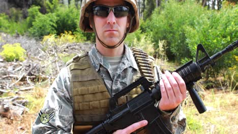 military soldier guarding with a rifle