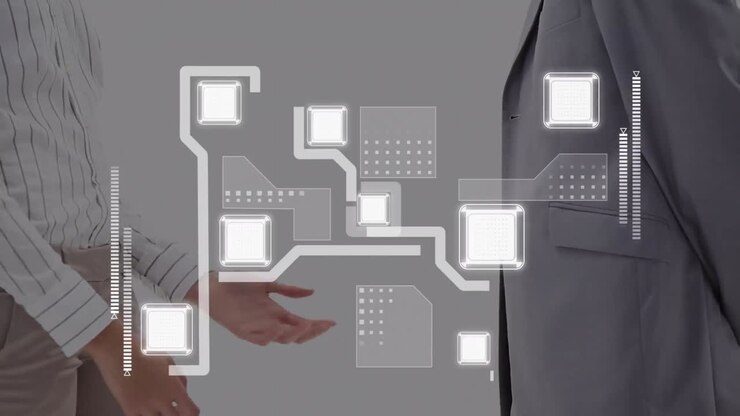 Digital interface layout against mid section of businessman and businesswoman shaking hands
