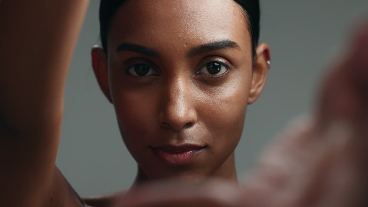 Woman, beauty and face with hands