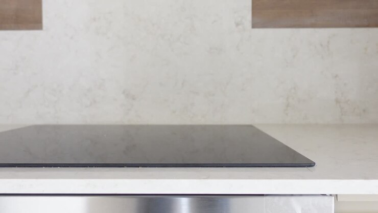 Close up of a modern induction stovetop in a kitchen