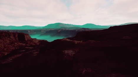 Glacier-epic-mountain-formations-under-dark-clouds