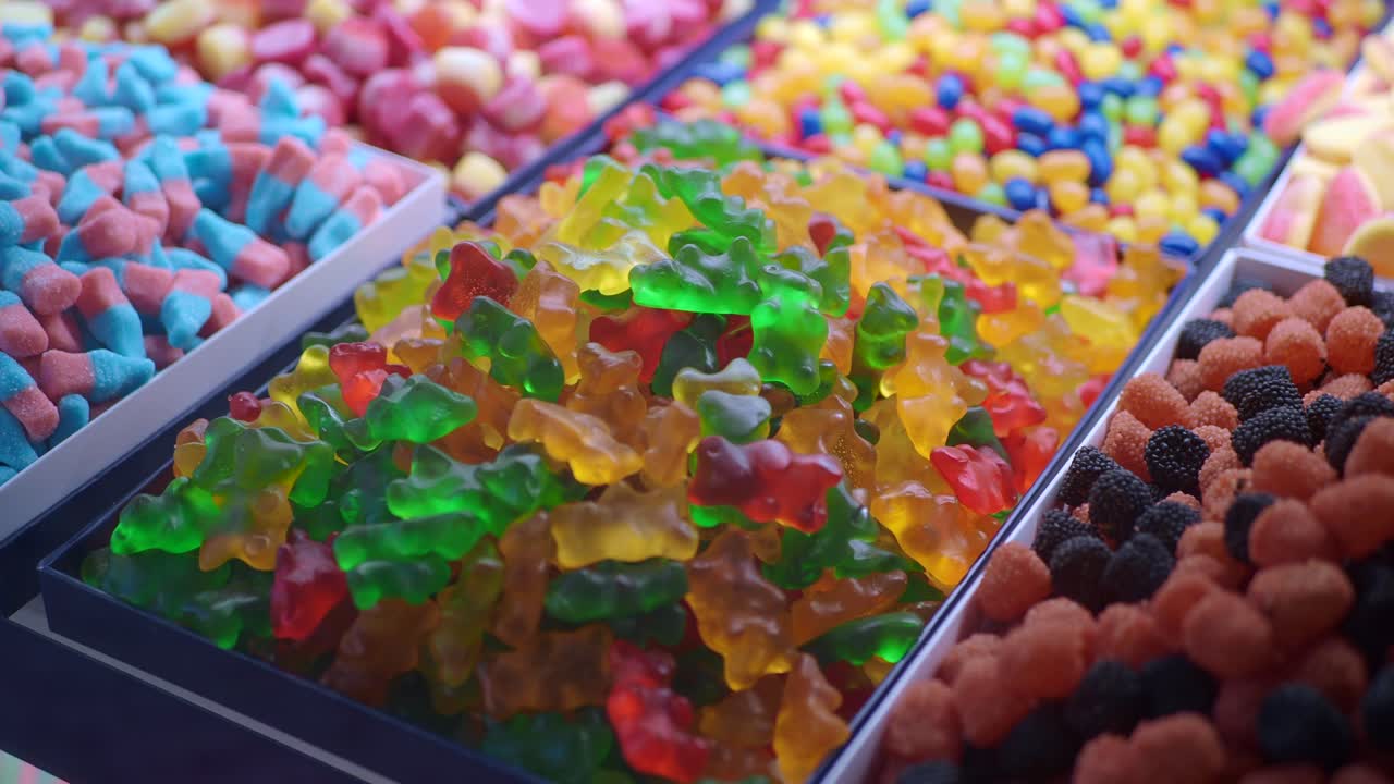 Assortment of Colorful Gummy Bears and Other Candies