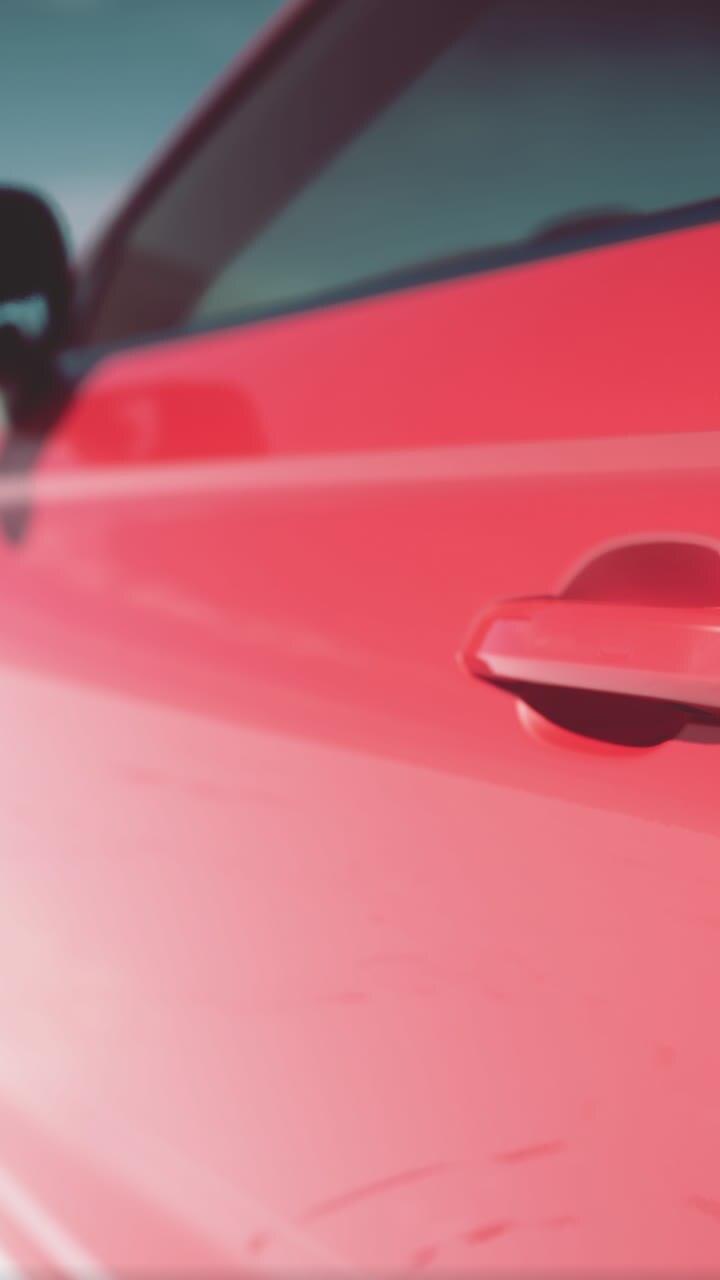 Close-up of a red car door