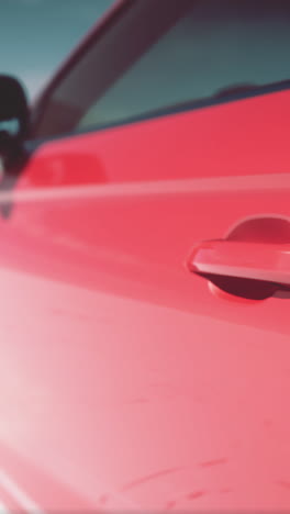 close-up of a red car door