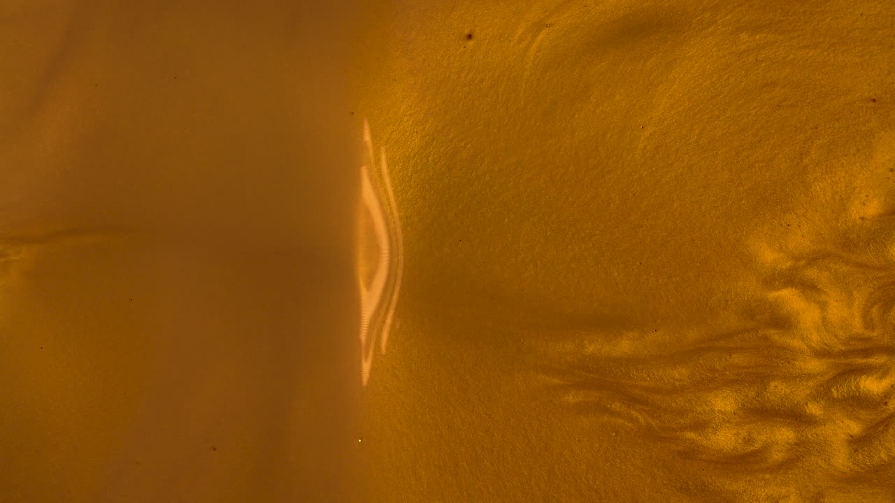 fondo de onda de oro líquido