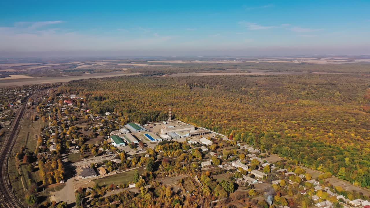 Aerial view of industrial zone. Industrial zone with development buildings, transportation, energy power infrastructure