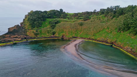 green island lagoon landscape drone view. beautiful cape shoreline on cloudy day