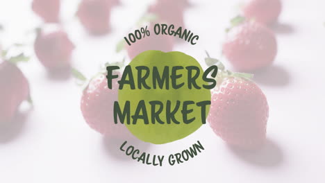 animation of farmers market text over strawberries on pink background