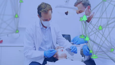 animation of caucasian male dentists examining patient over network of connections with icons